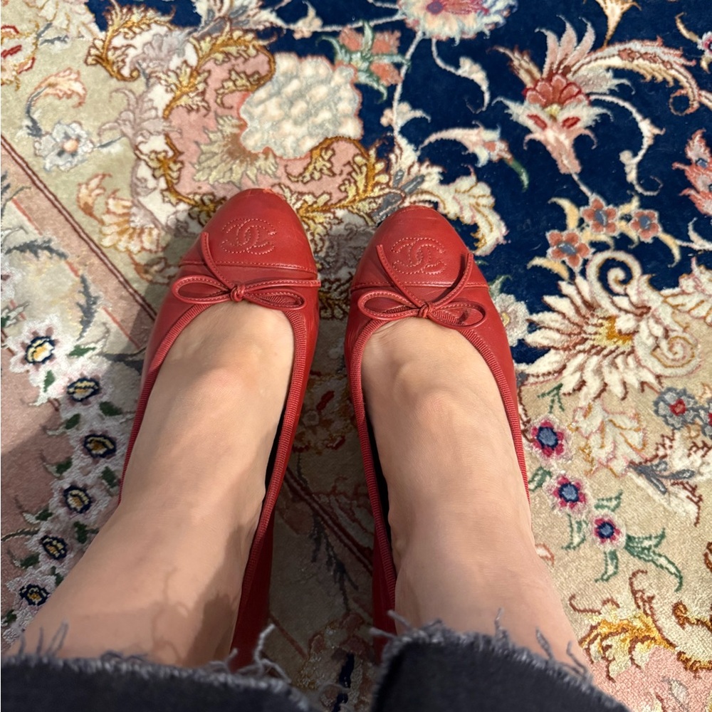 CHANEL Red Leather Flats with Bow Detail